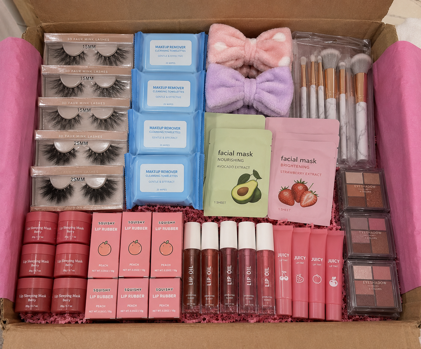 Assorted beauty products including false eyelashes, face masks, and lip products in a box.